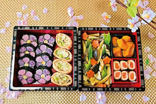 Hanami bento boxes are filled with spring colors.