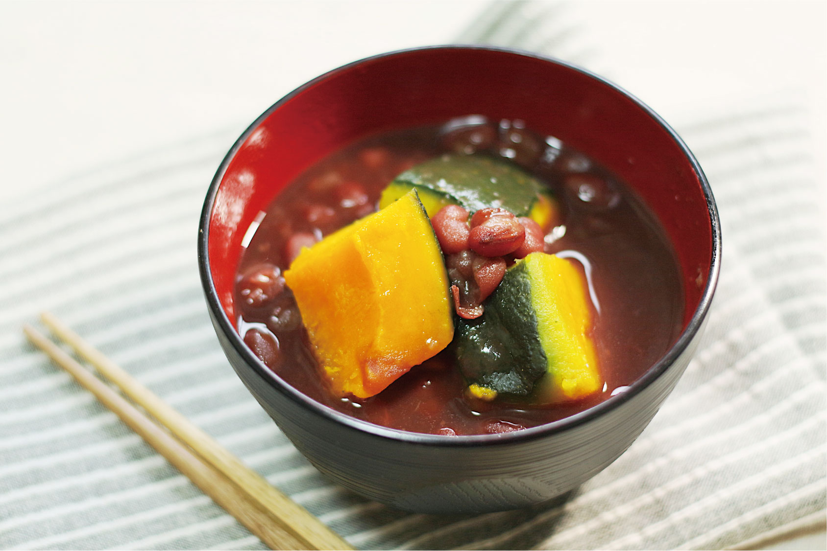 Pumpkin zenzai, kabocha in a sweet soup made of red beans.