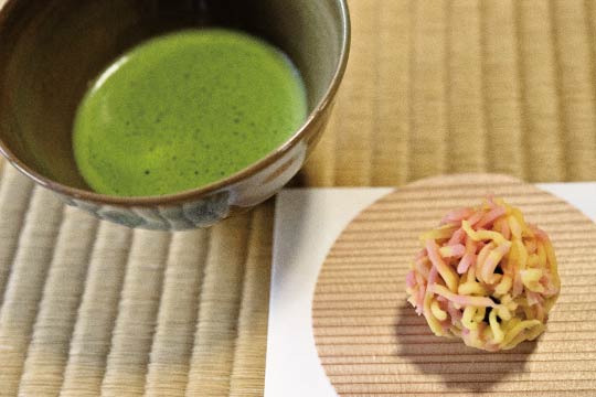 The sweet is an autumn leave motif. A sweet is consumed before the tea is served.